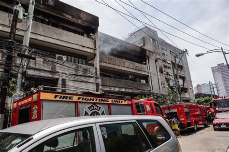 Fire hits building in Makati City .